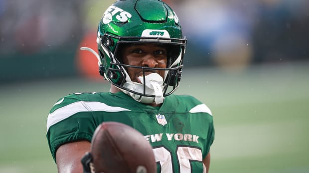 New York Jets running back Breece Hall (20) celebrates after a touchdown reception during the second half against the Houston Texans at MetLife Stadium.